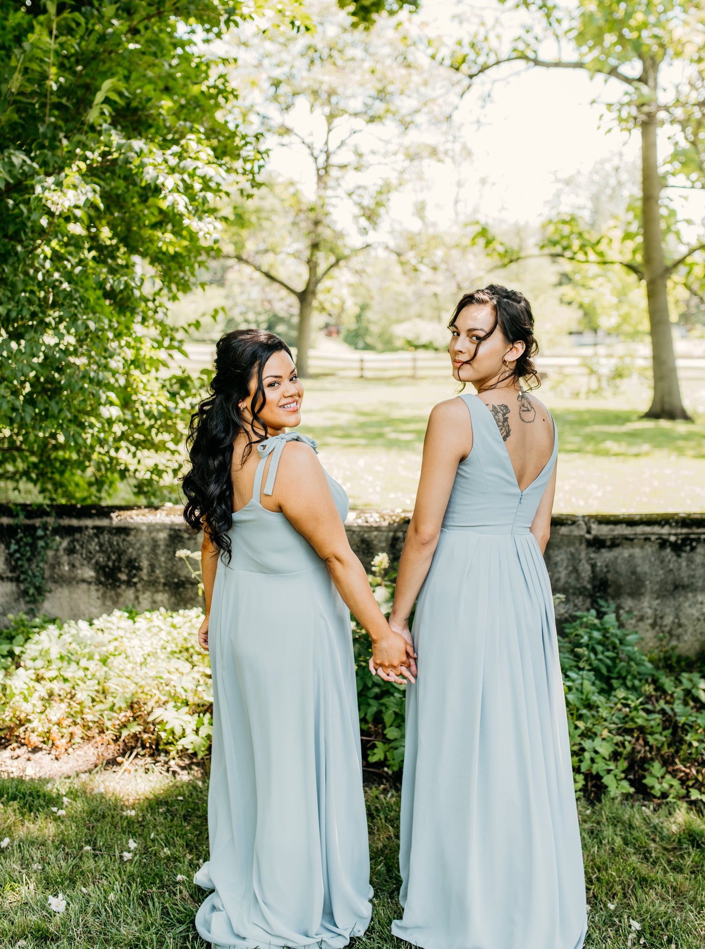 Hope (far right) wears the Margot Dress