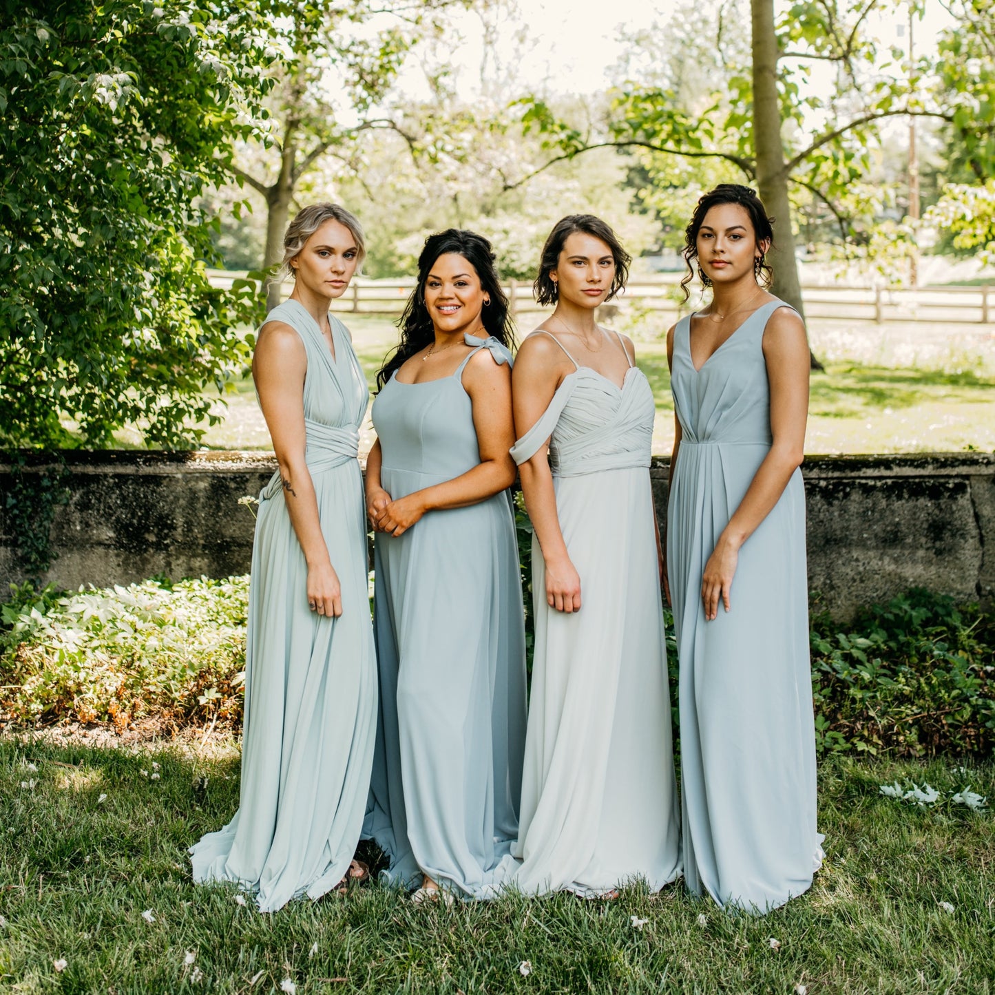 Hope (far right) wears the Margot Dress