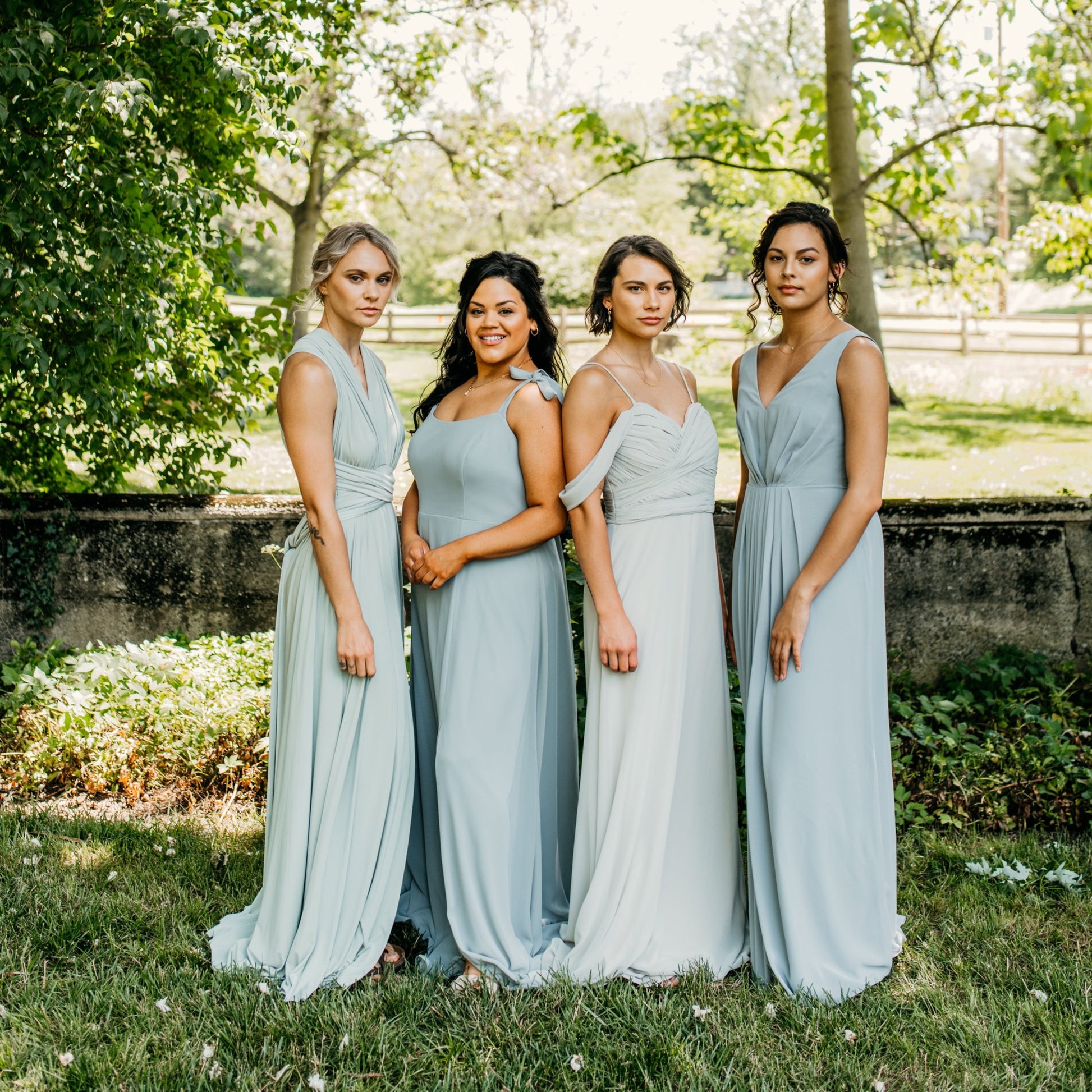 Hope (far right) wears the Margot Dress