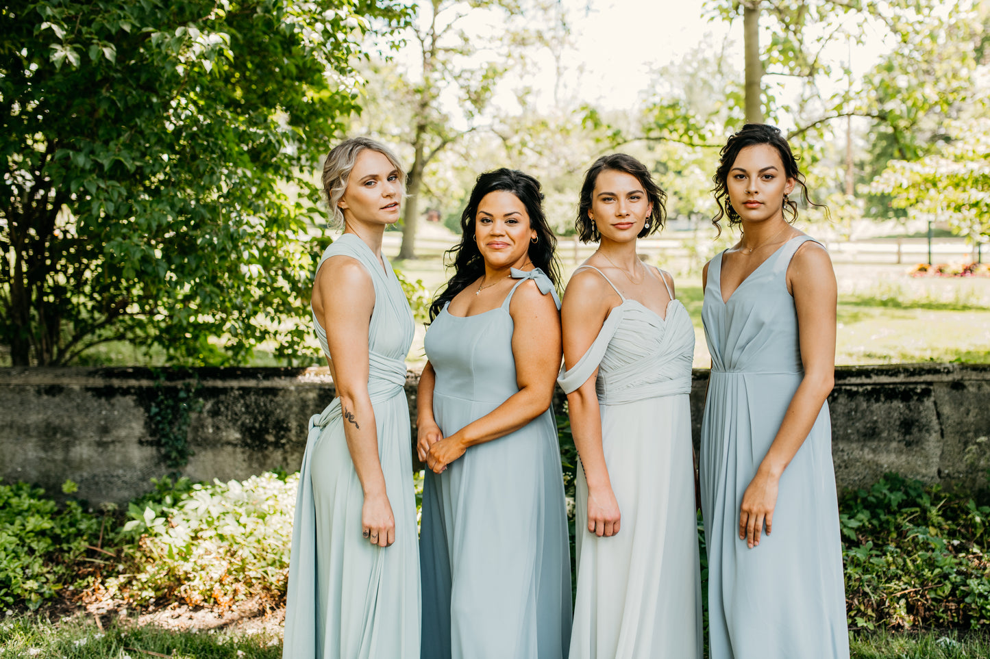 Mia (second from right) wears the Taylor Dress