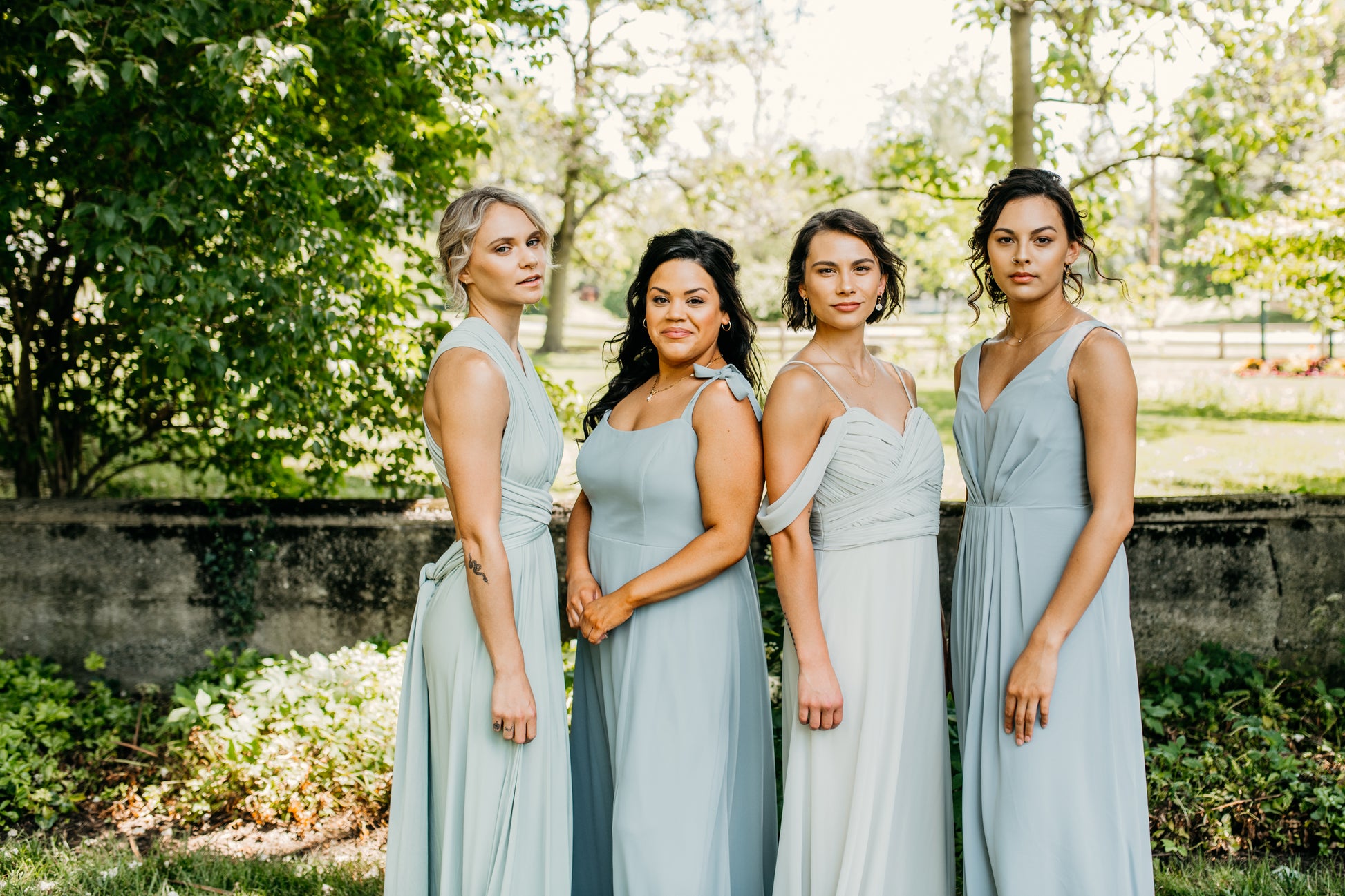 Mia (second from right) wears the Taylor Dress