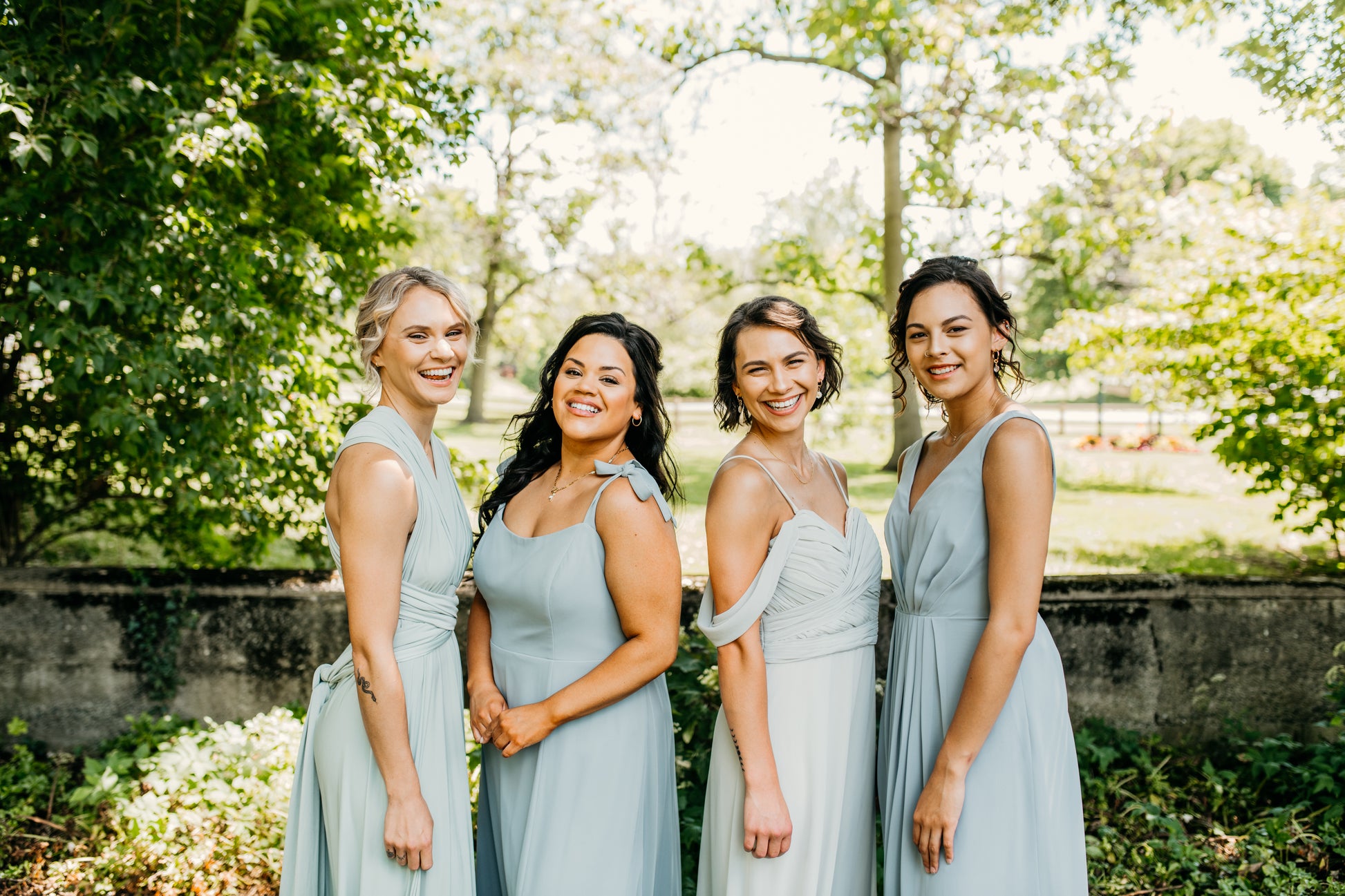 Mia (second from right) wears the Taylor Dress