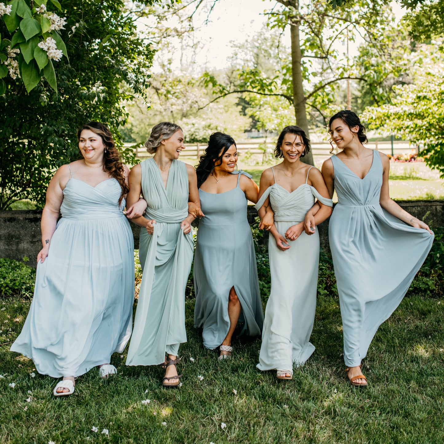 Hope (far right) wears the Margot Dress