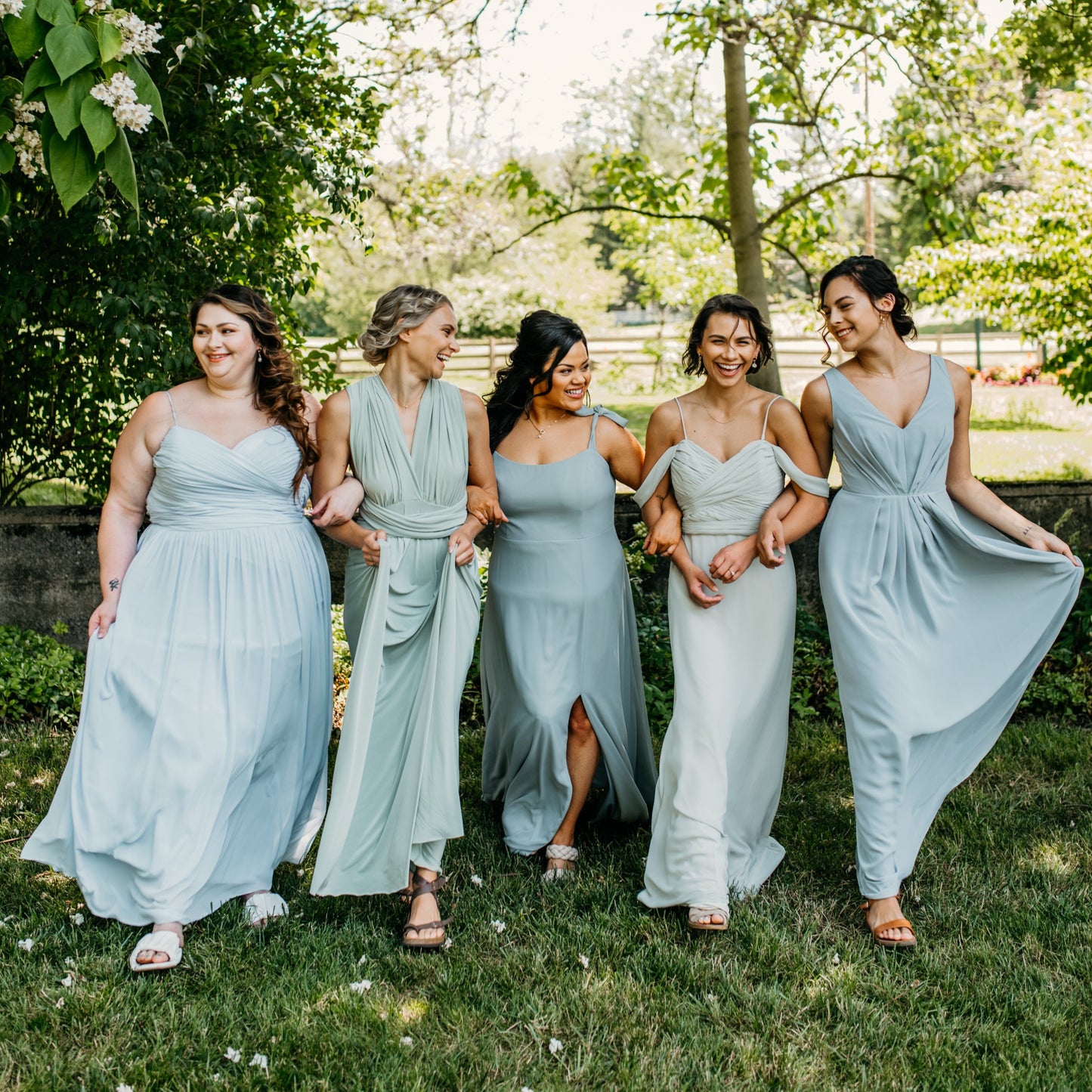 Katie (far left) wears the Jill Dress