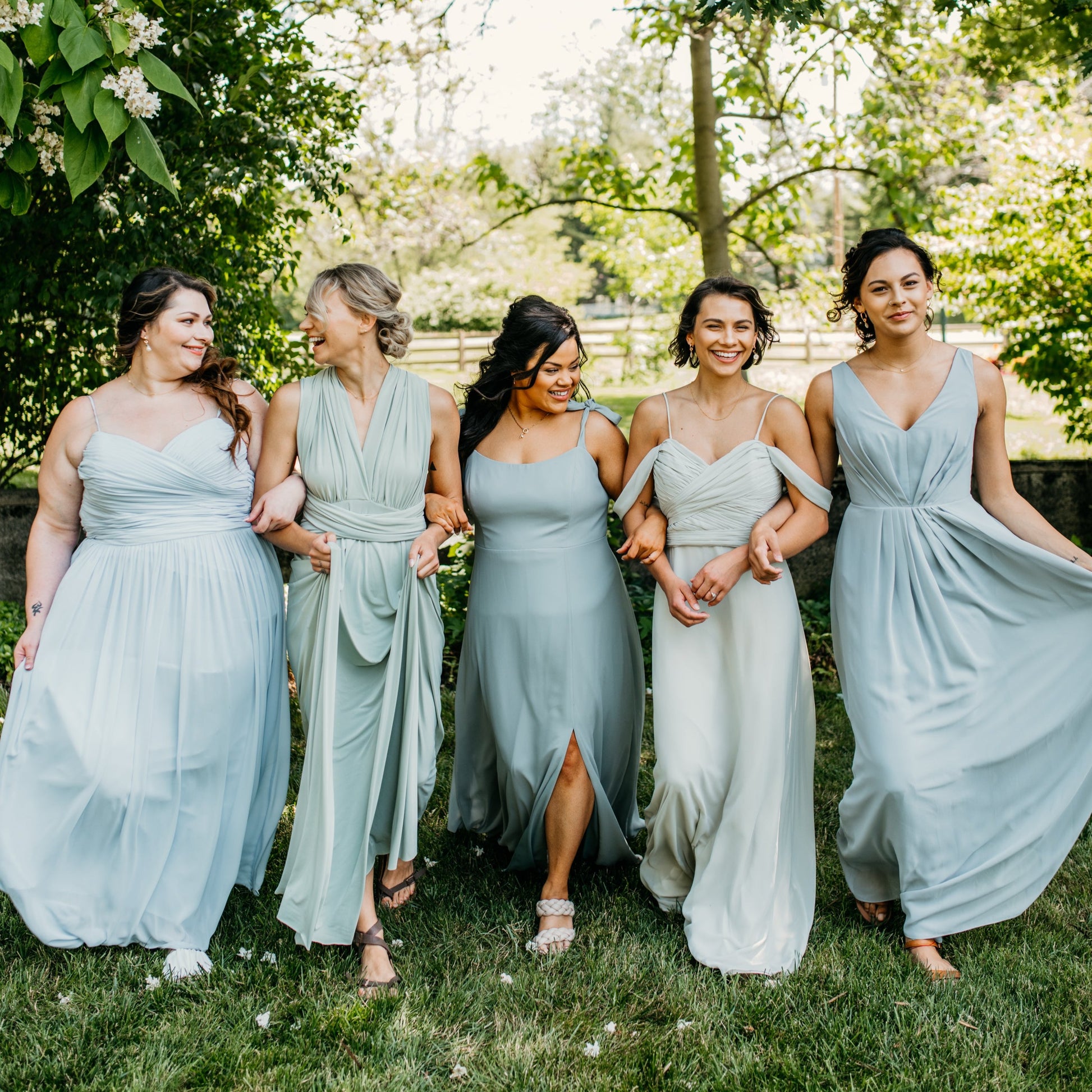 Mia (second from right) wears the Taylor Dress