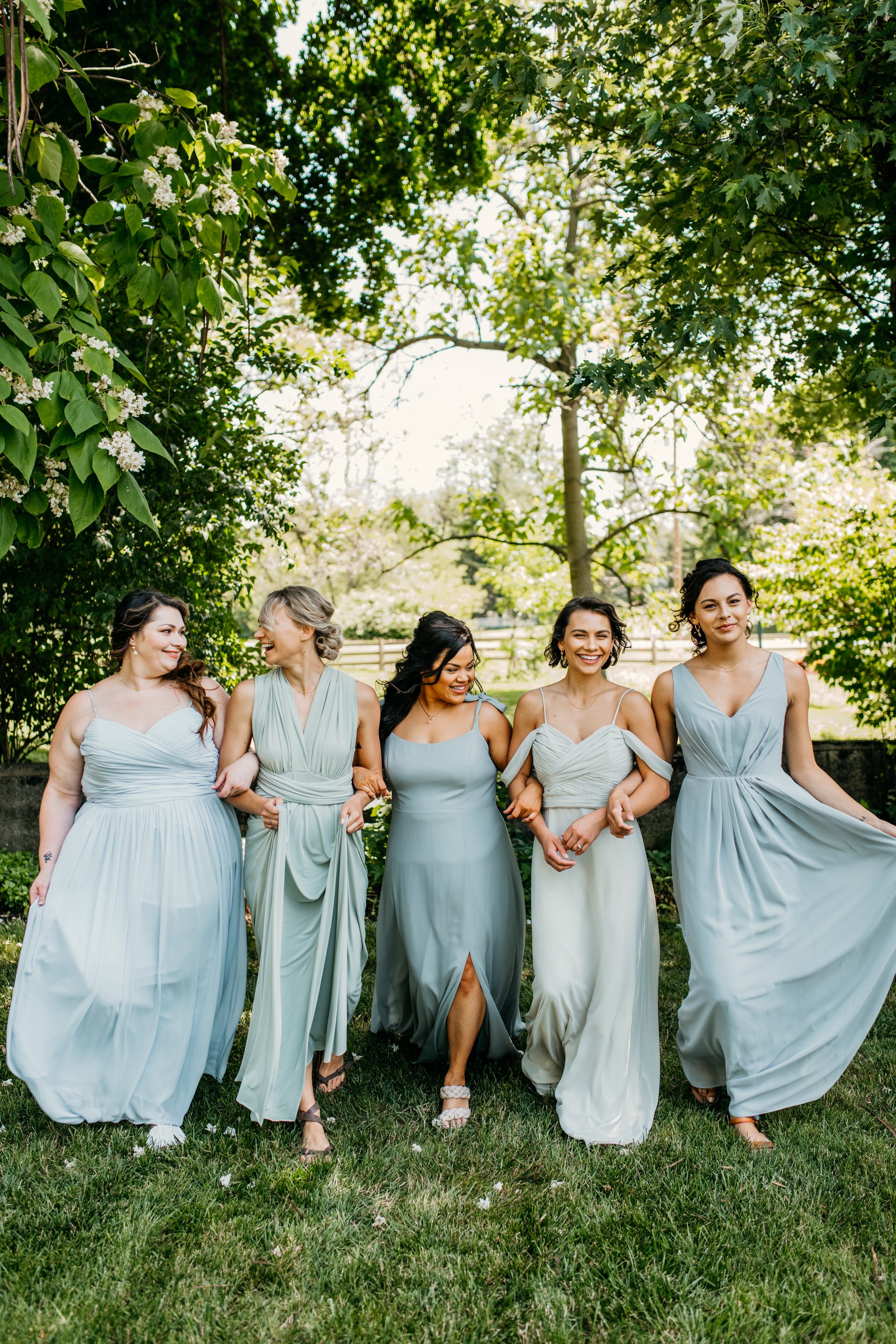 Hope (far right) wears the Margot Dress