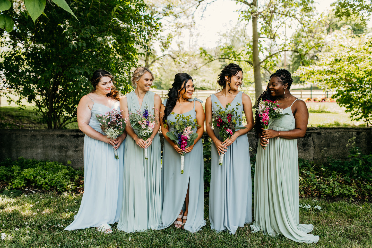 Jess (far right) wears the Ryleigh Dress
