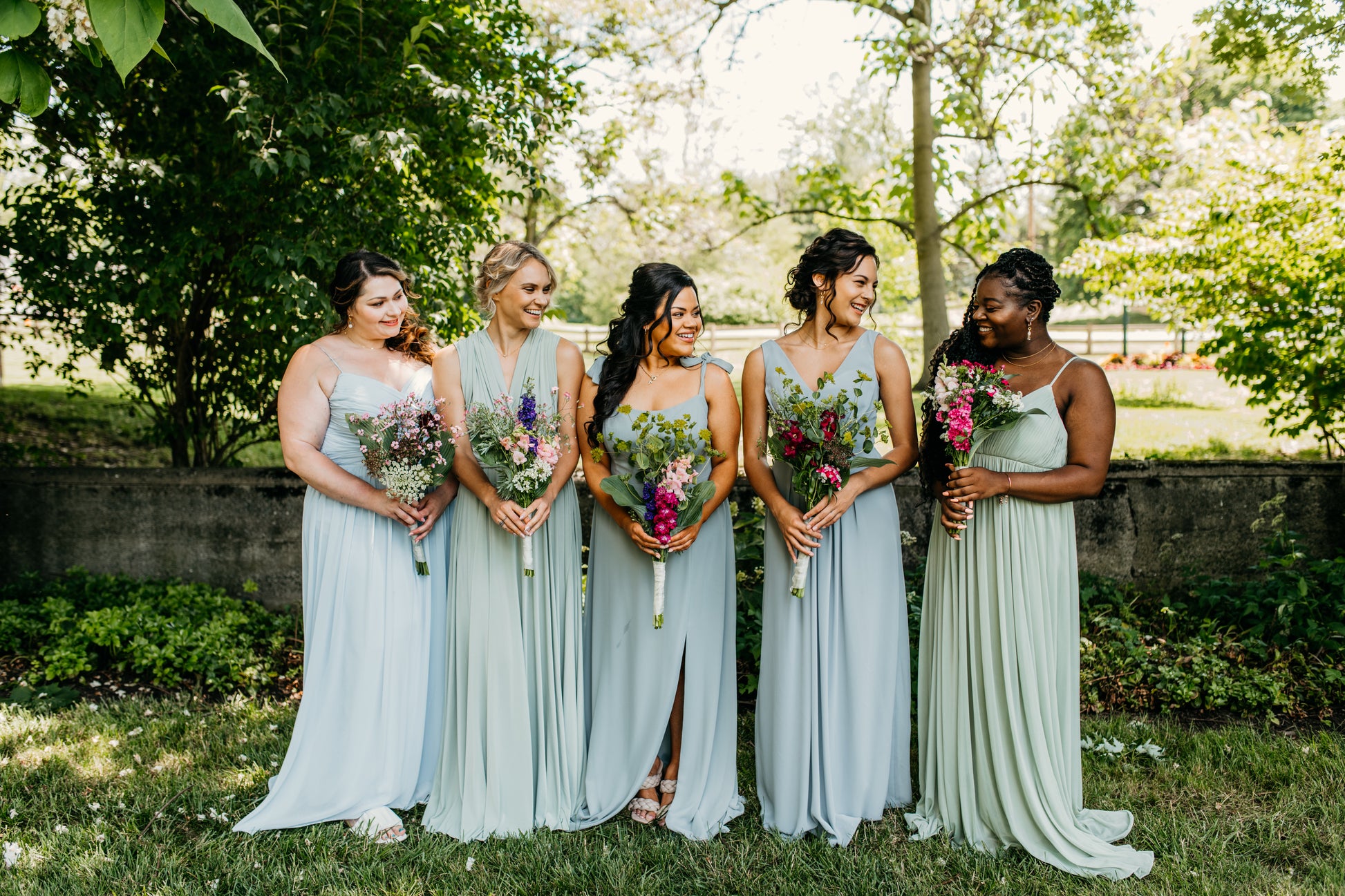 Jess (far right) wears the Ryleigh Dress