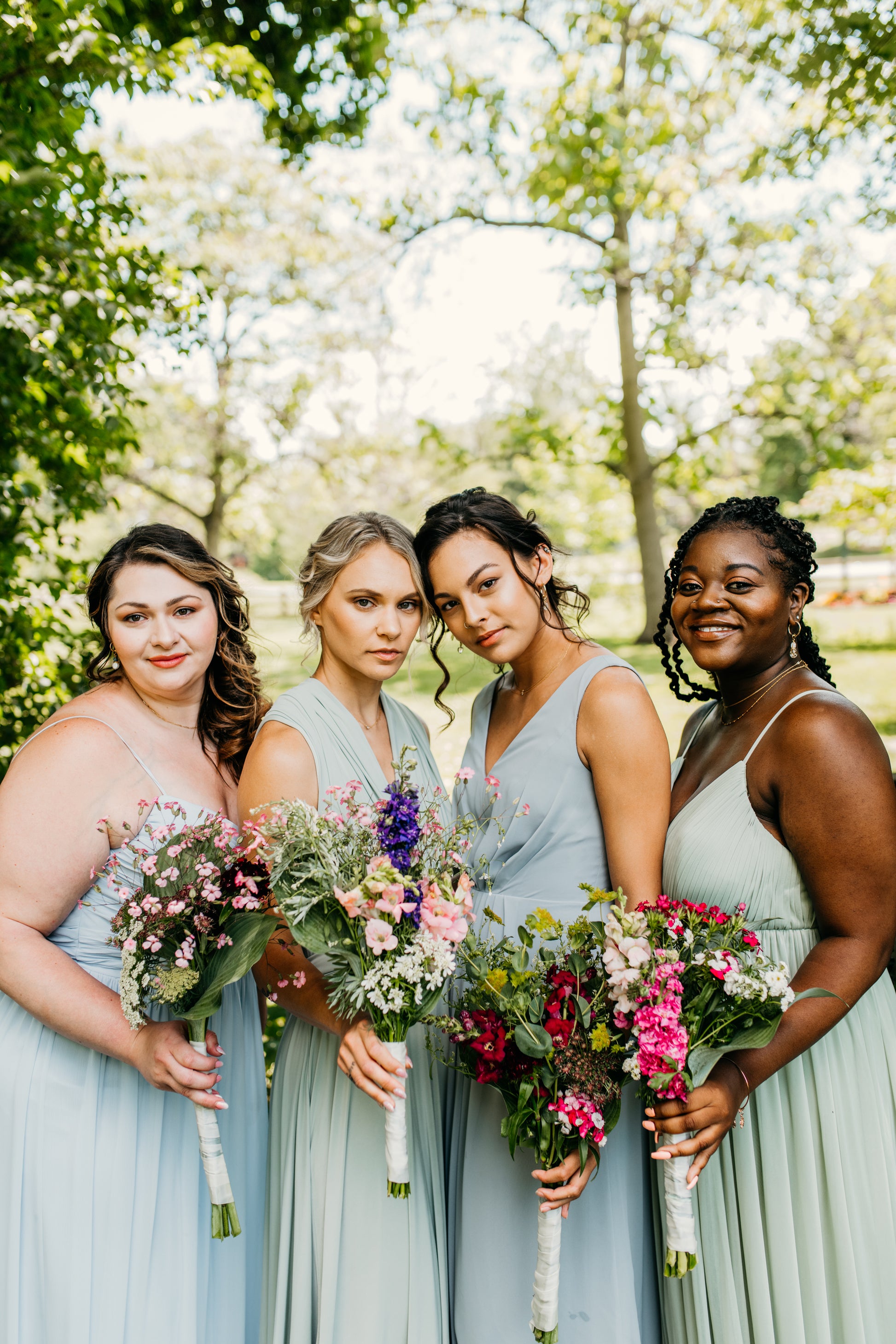 Jess (far right) wears the Ryleigh Dress
