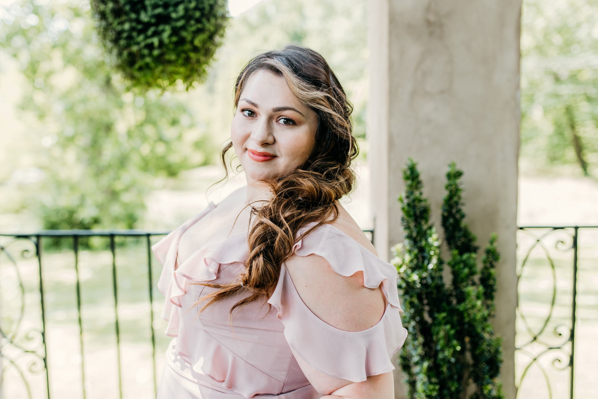 Katie wears Isla in Dusty Light Pink