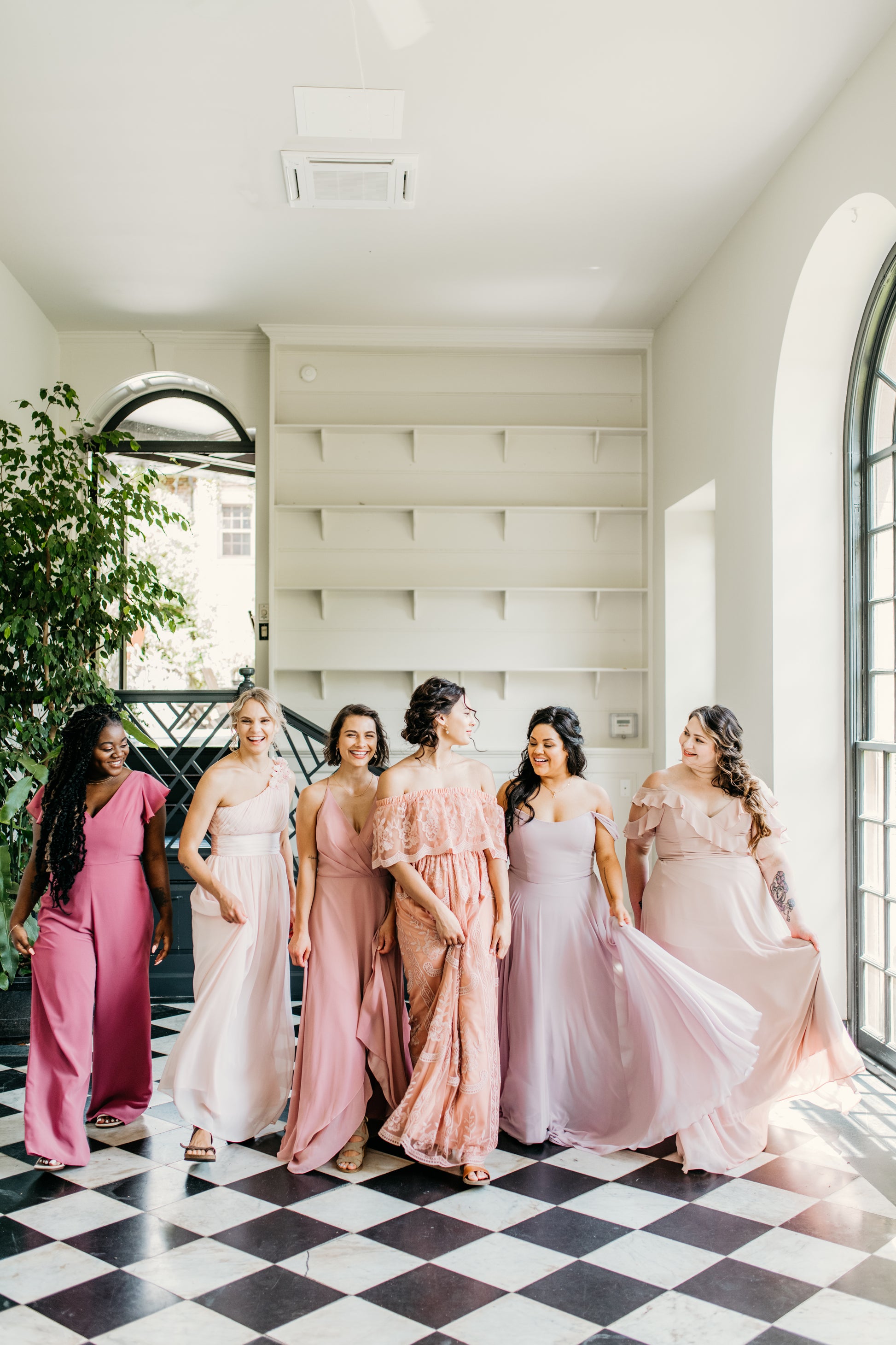 Jess (far left) wears the Leah Jumpsuit