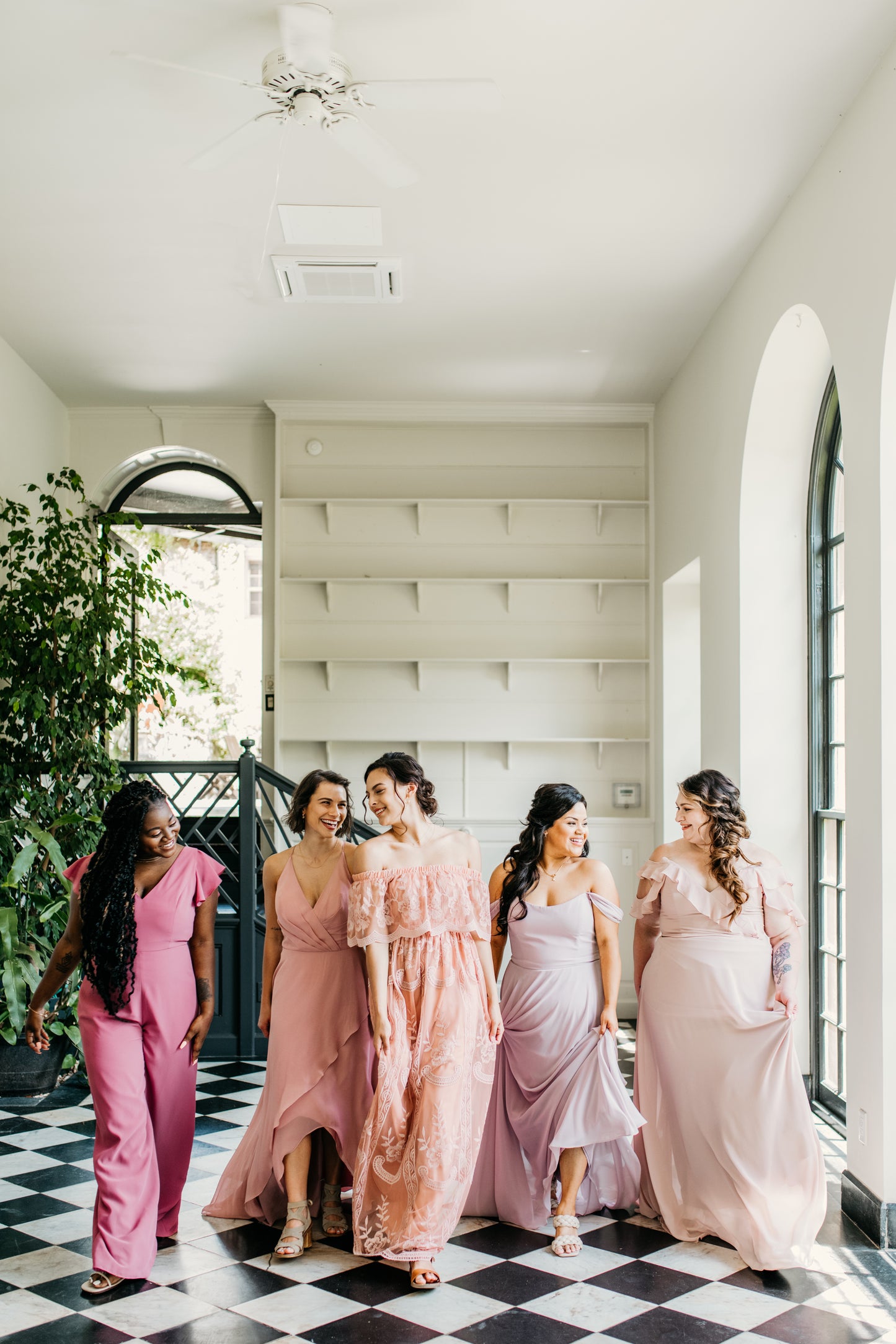 Jasmine (second from right) wears the Isabella dress