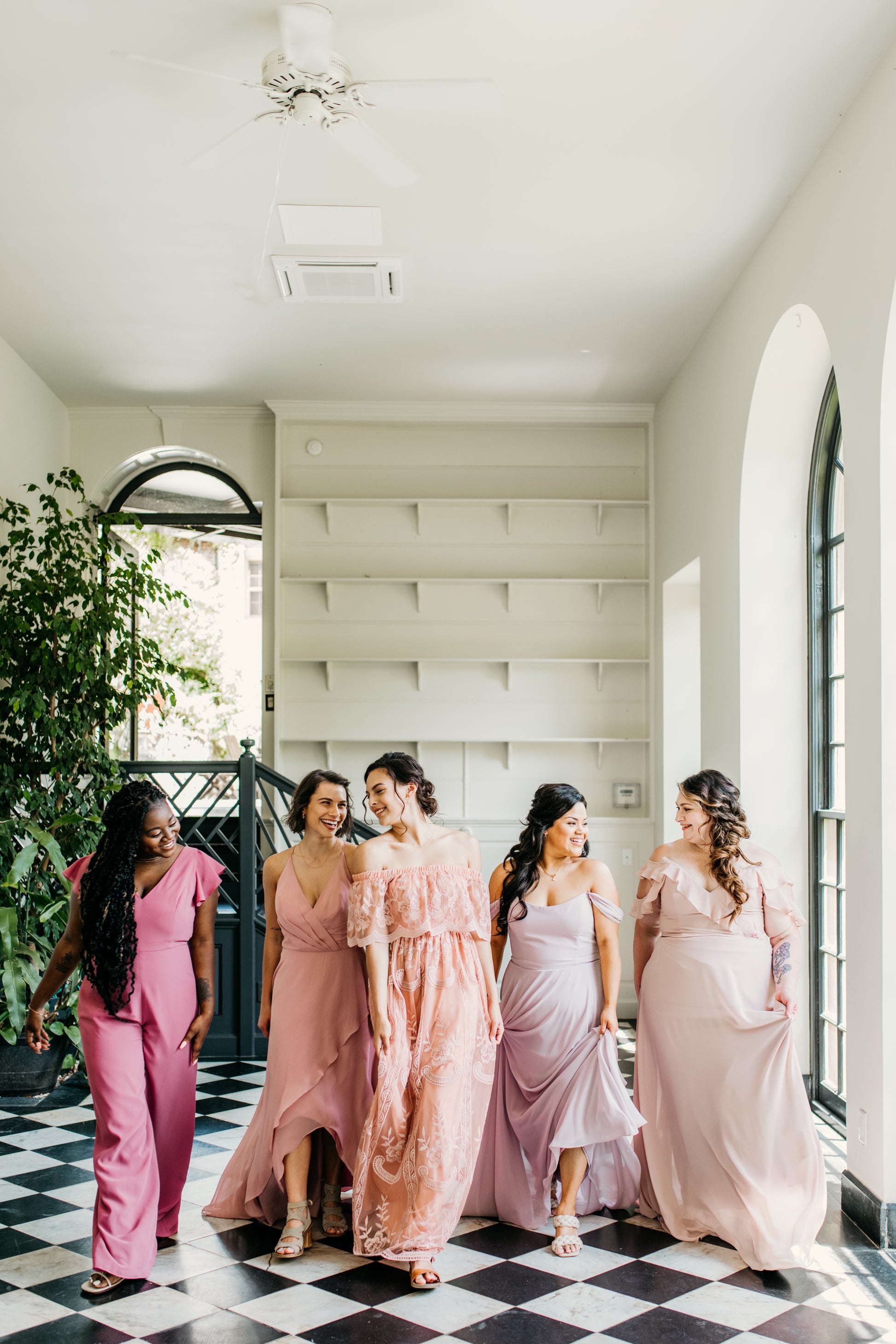 Jasmine (second from right) wears the Isabella dress