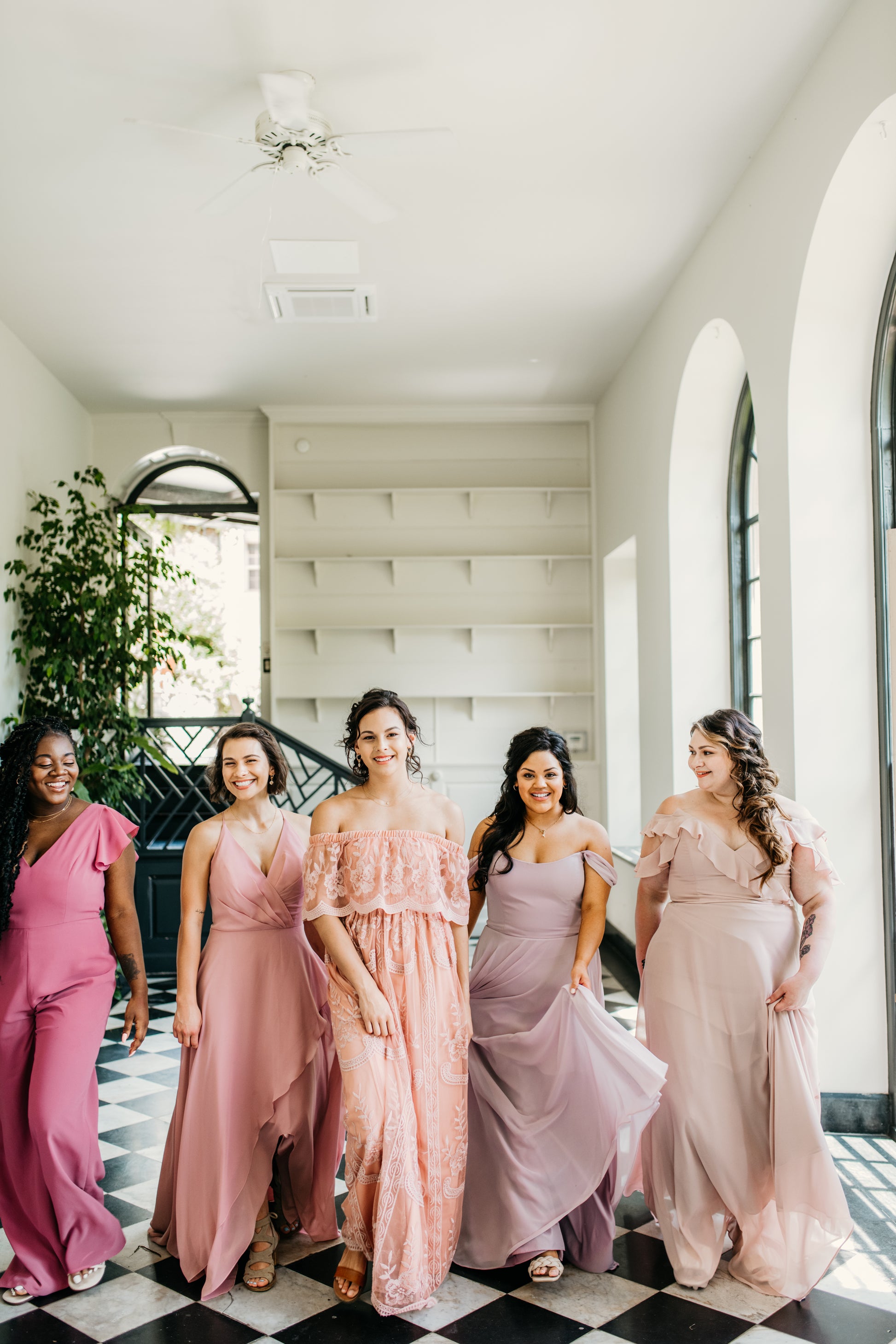 Jasmine (second from right) wears the Isabella dress