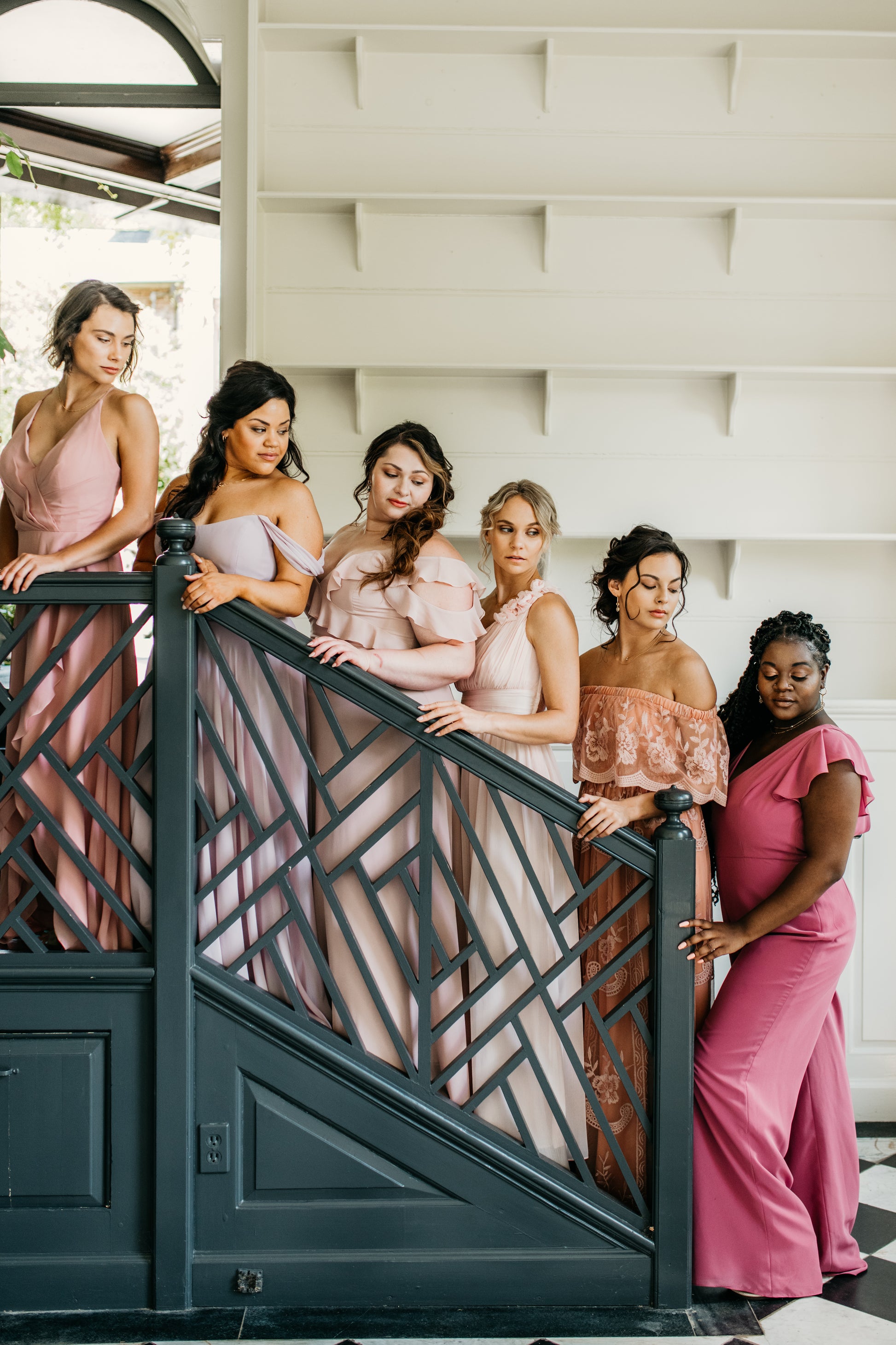 Jess (far right) wears the Leah Jumpsuit