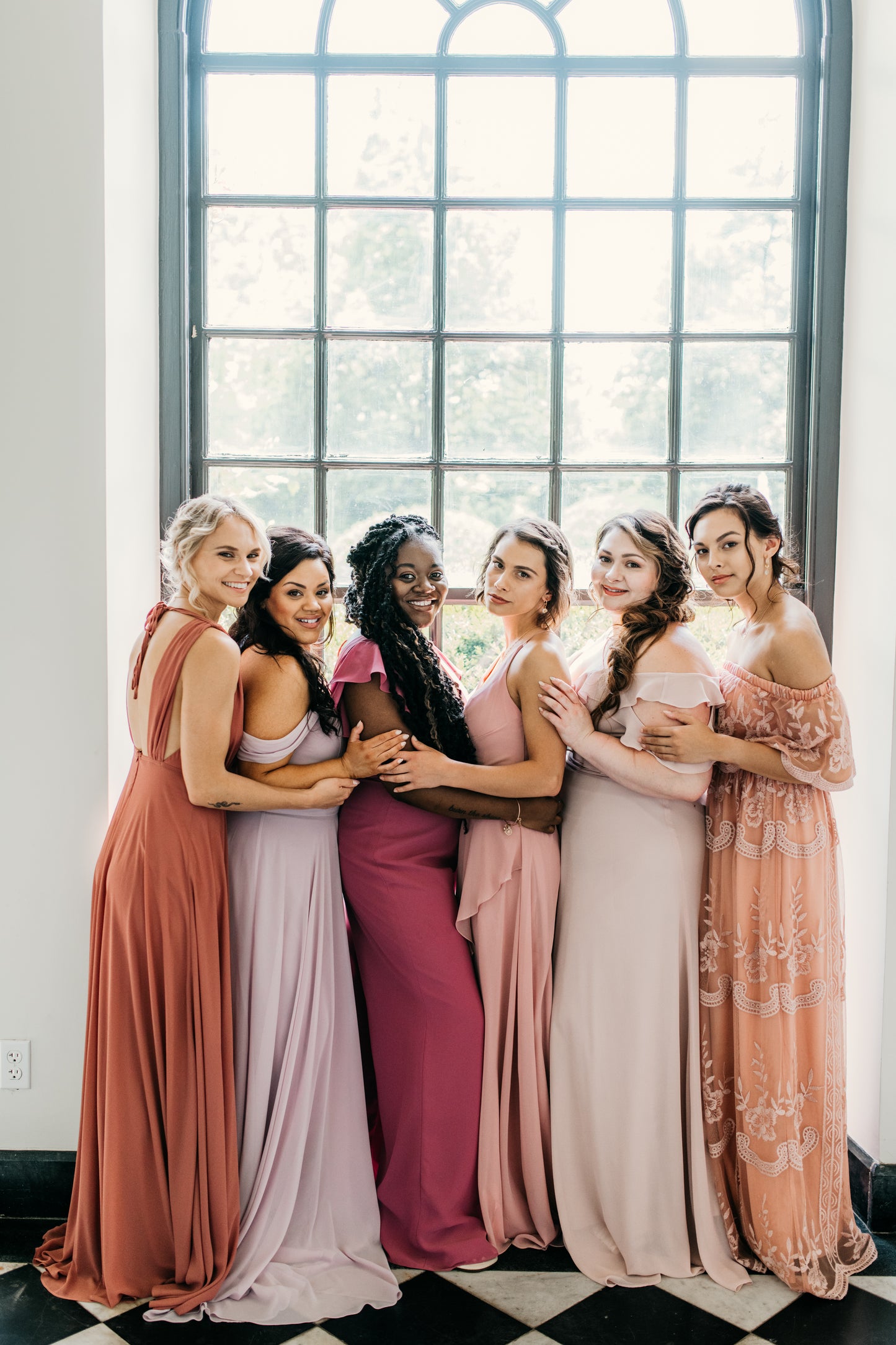 Hope (far right) wears the CLaire Dress
