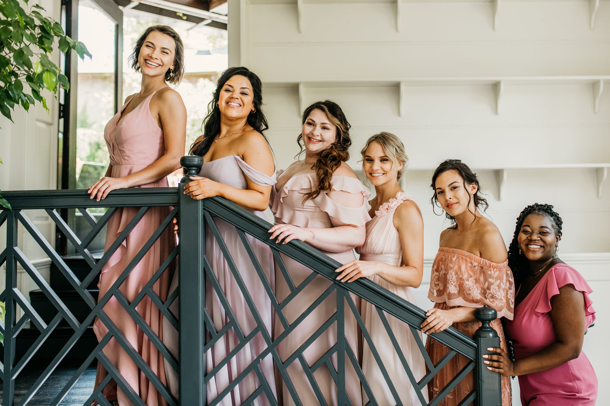 Erin (third from right) wears the Grace dress