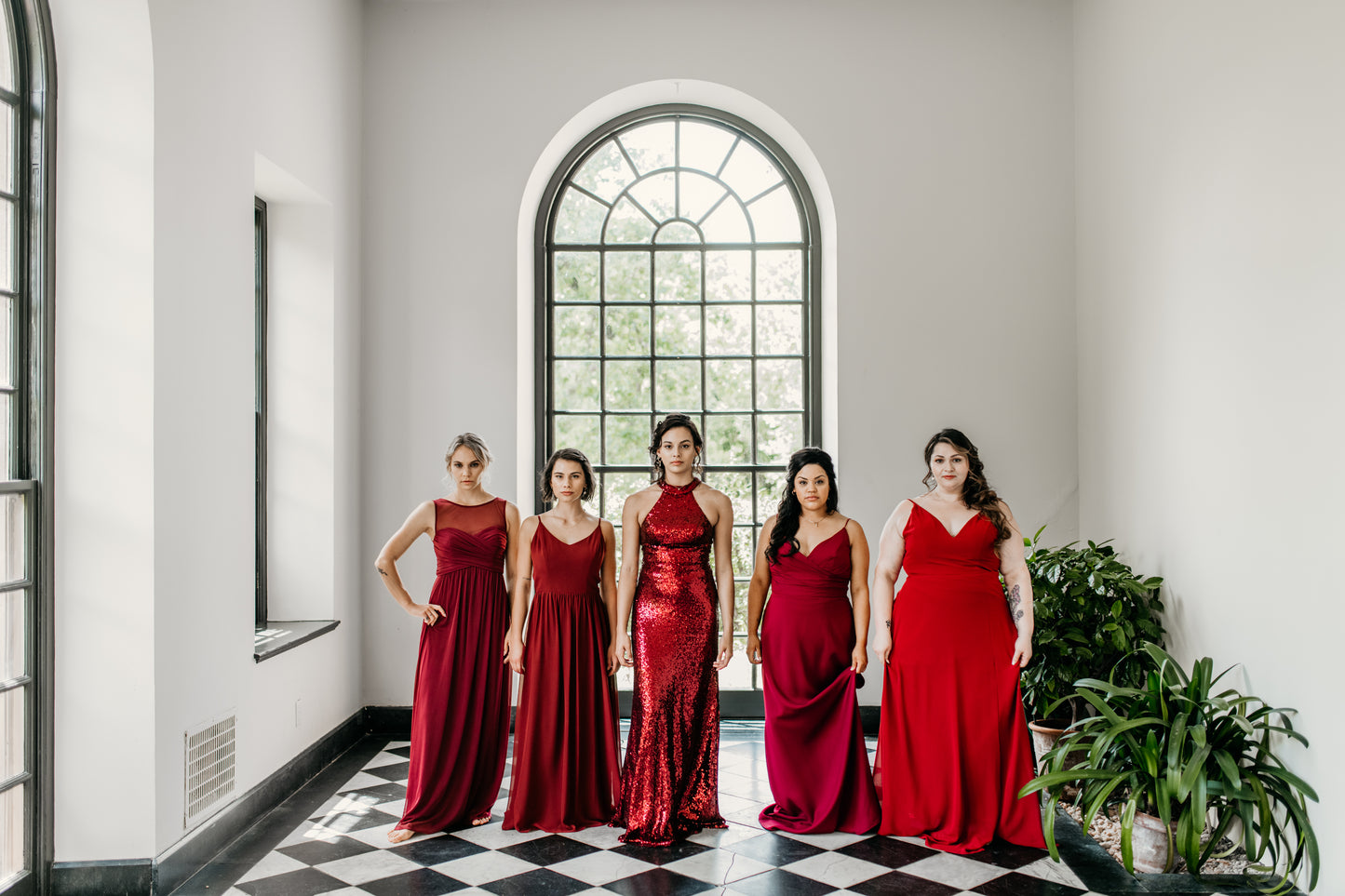 Erin (far left) wears the Athena Dress
