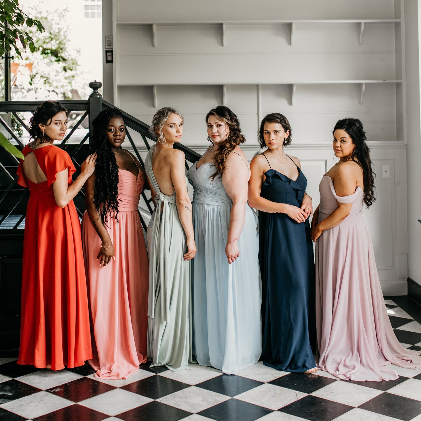 Erin (third from left) wears the Juliana Dress
