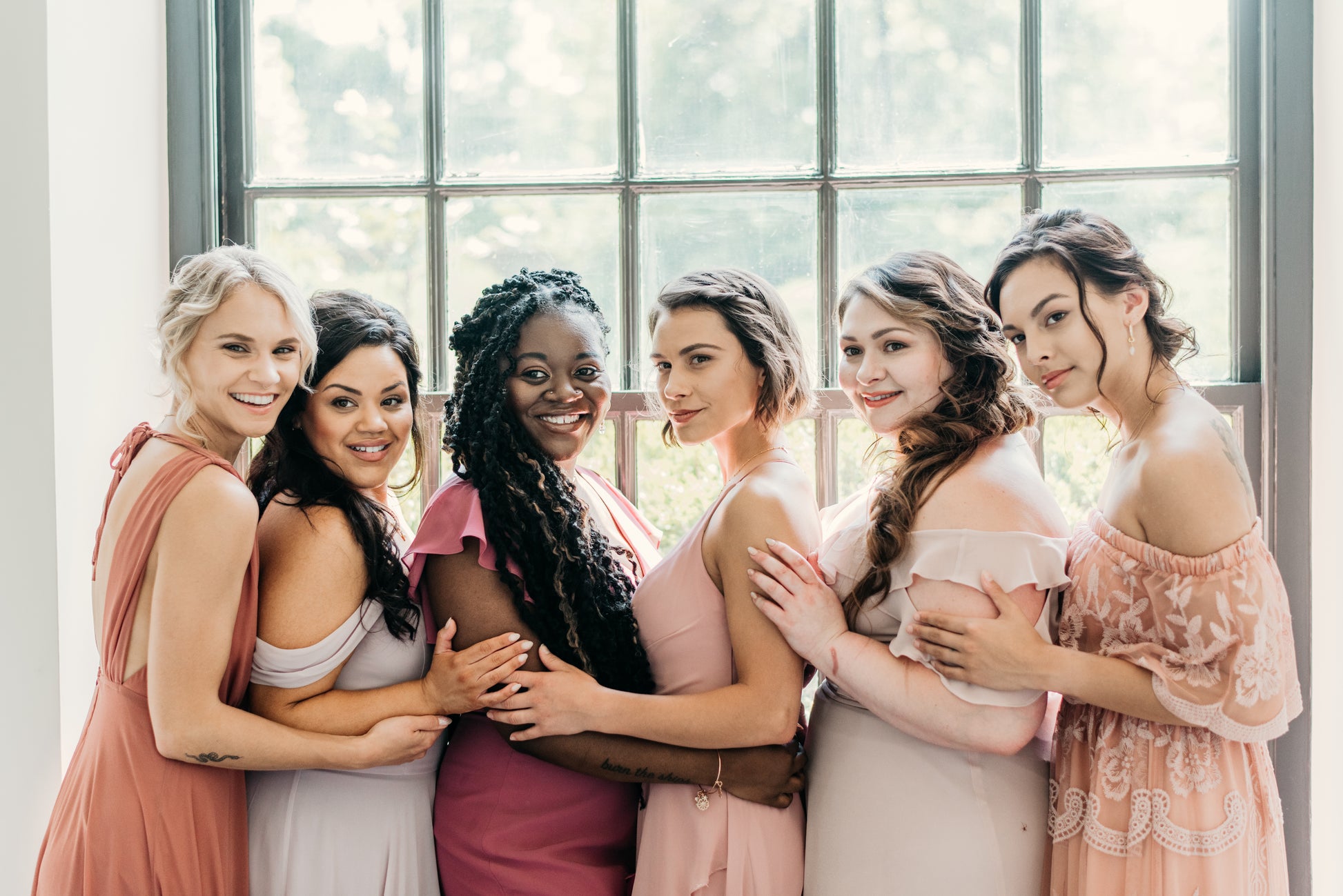 Hope (far right) wears the Claire Dress