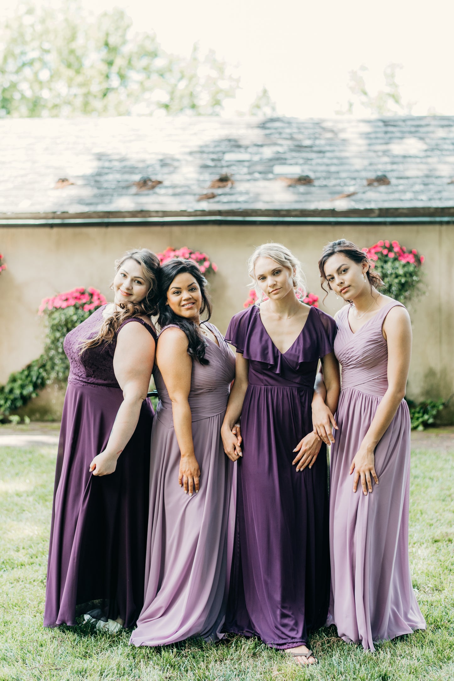 Erin (second from right) wears Elizabeth dress