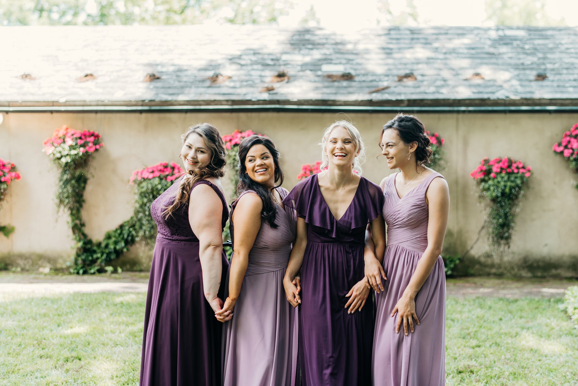 Erin (second from right) wears Elizabeth dress