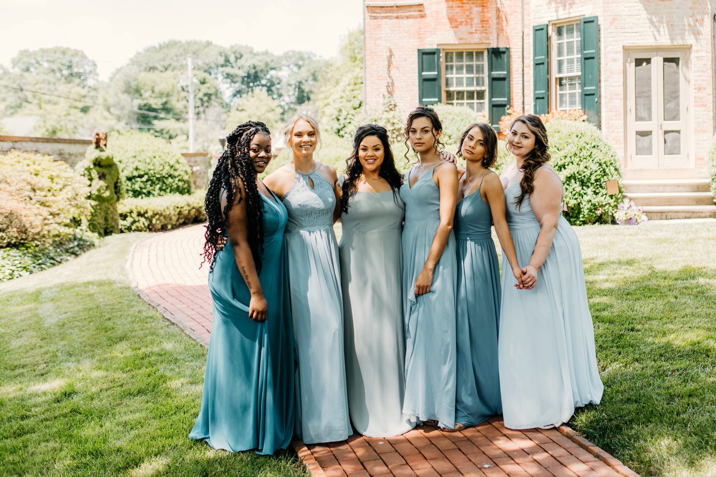 Jess (left) wears the Alyssa DressJess (left) and Hope (third from right) wear the Alyssa Dress