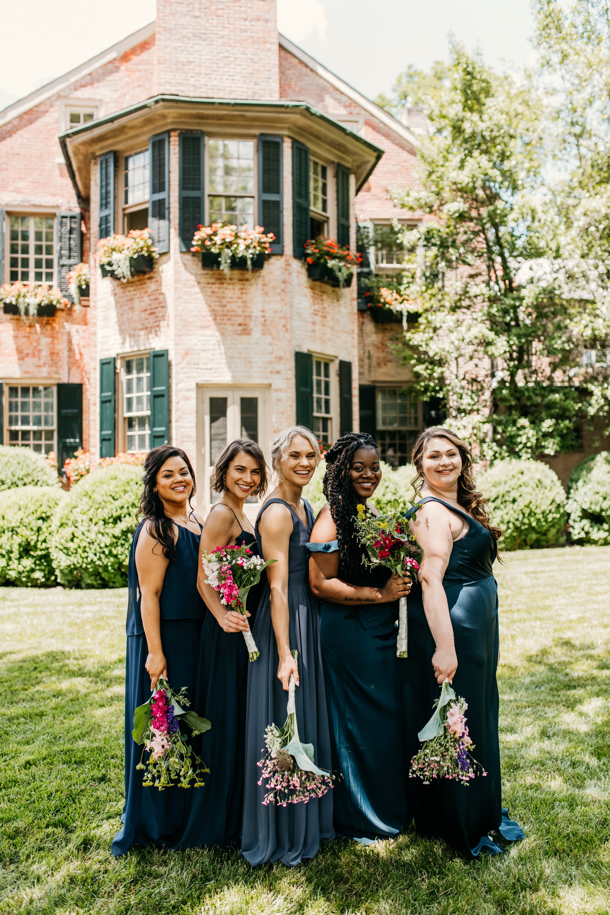 Erin (center) wears the Willow dress